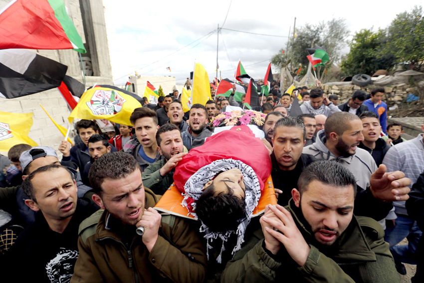 The funeral of Musaab al-Tamimi in the village of Deir Nitham, northwest of the city of Ramallah, to his last resting place. Photo credit: Tamer Bana/WAFA