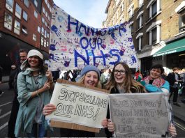 Marchers on a demonstration demanding an end to the privatisation of NHS