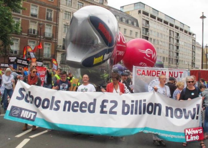 Teachers on a demonstration against Tory government education cuts and privatisation demand extra money for schools