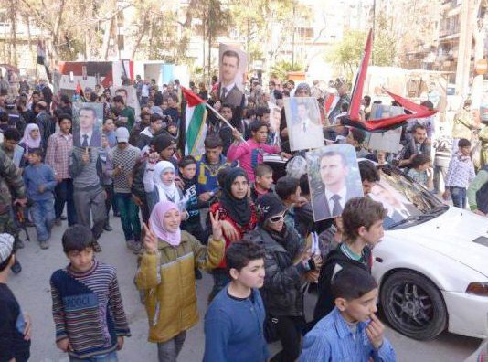 Syrians march in support of President Assad – Syrian Kurds in Afrin are now calling on the Syrian army to defend them