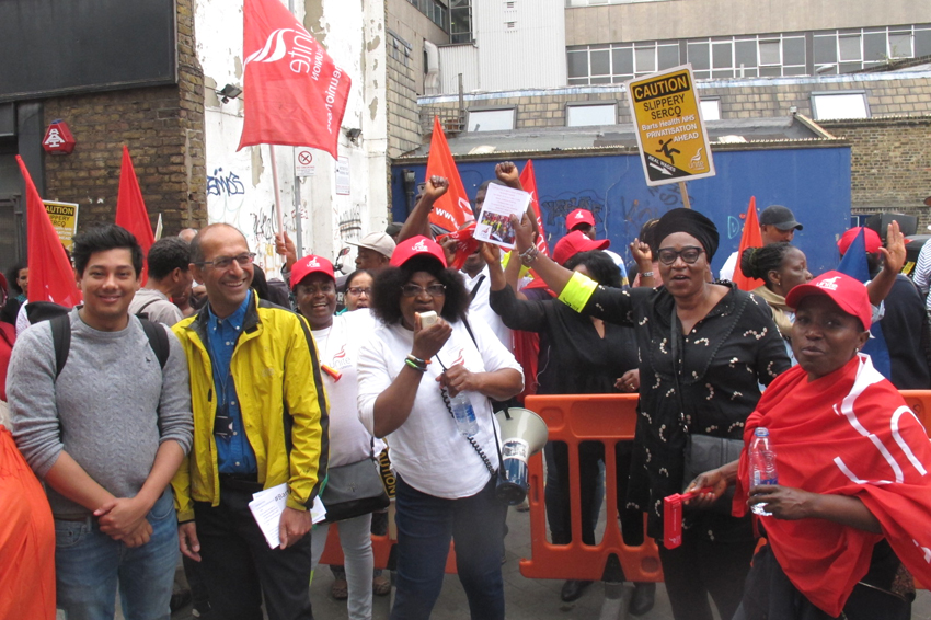 Cleaners and caterg staff in the NHS working for Serco at the London Hospital taking strike action last year against excessive workload and pay cuts