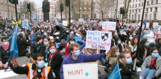 Junior doctors block Whitehall during their strike – doctors oppose NHS England’s new dangerous ‘Stay Well Pharmacy’ campaign