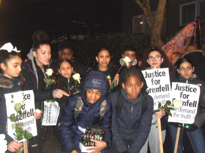 Youth on December’s silent march for Grenfell in North Kensington, London – they demand Justice for Grenfell