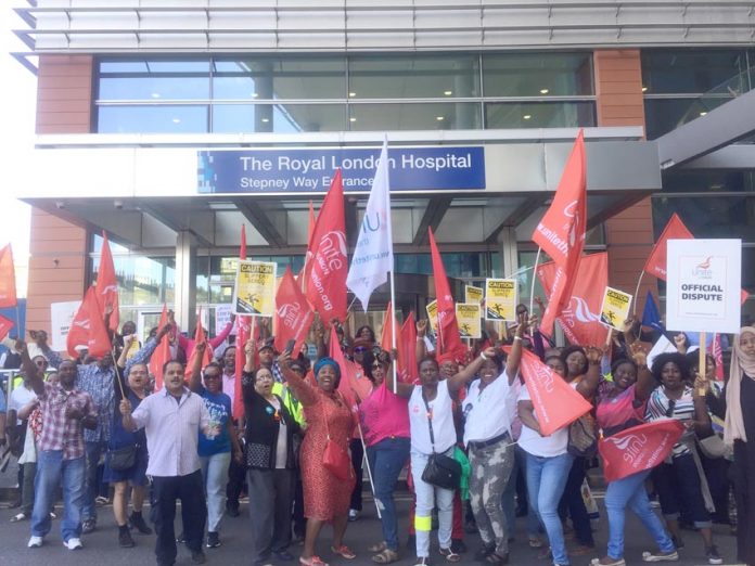 Serco workers outside the Royal London Hospital during strike action last year – Serco have now been awarded Carillion’s contracts