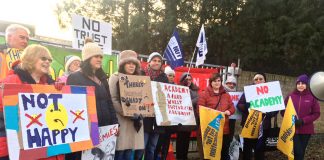 Striking NEU members on the picket line at The Village School in Kingsbury yesterday morning