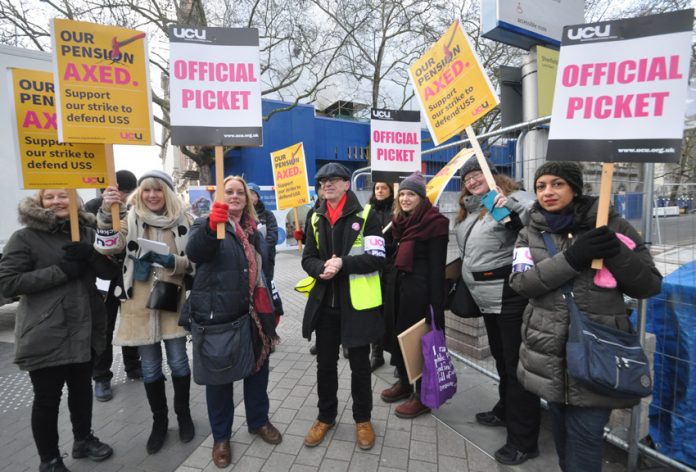 Students join lecturers on the picket line outside Imperial College in west London on the second day of their nationwide strike