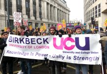 Thousands of lecturers marched through central London yesterday, the fifth day of their strike in defence of pensions