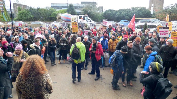 Striking lecturers and masses of students were addressed yesterday by Chris Townsend representing the student occupation