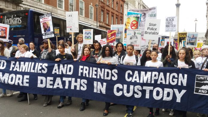 Families and friends of those who died in police custody marching on Downing Street – victims of police spying stormed out of the inquest in protest on Wednesday