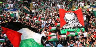 Fans of Scottish team Celtic raise Palestinian flags during a game against Israeli team Hapoel Beersheba last year