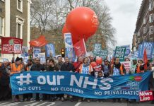 Health workers marching to defend the NHS, demanding no cuts, no closures and no privatisation