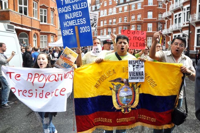 Demonstration outside the Ecuadorian embassy in London in support of Julian Assange on 16th August 2012, the day Ecuador granted him asylum – Assange’s supporters are expected to flock to the embassy to defend him after this latest attack