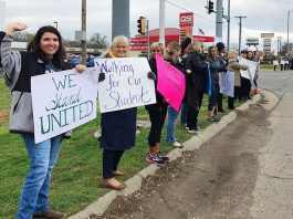 Teachers from school districts in Sequoyah County, Oklahoma on the picket line striking over pay and conditions