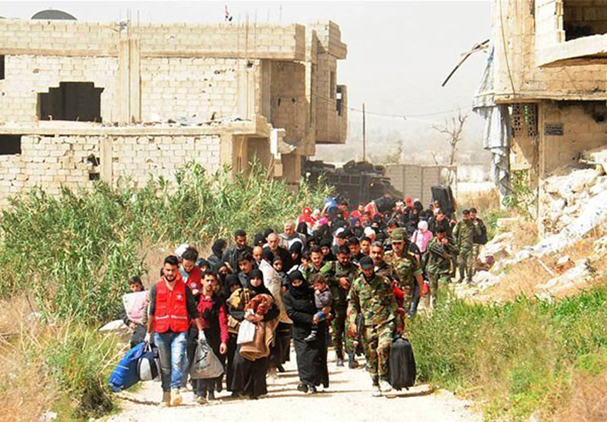 Syrians leave Eastern Ghouta after it was liberated from the terrorists by the Syrian army and its allies