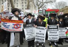 Orthodox Jews, joining the rally on Saturday against the Israeli killings in Gaza, condemn Zionist terrorism