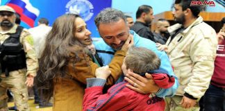 An abductee of Jaish al-Islam terrorist group, freed by the Syrian army in Douma, is reunited with his family