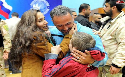 An abductee of Jaish al-Islam terrorist group, freed by the Syrian army in Douma, is reunited with his family