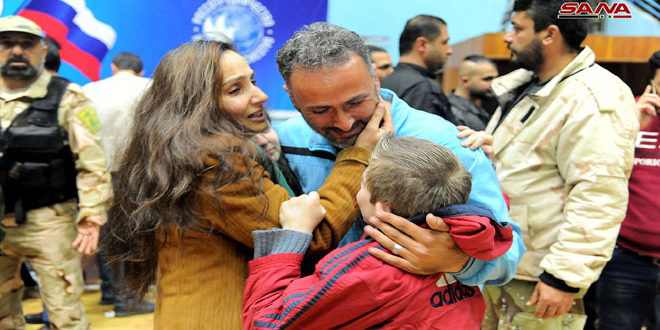An abductee of Jaish al-Islam terrorist group, freed by the Syrian army in Douma, is reunited with his family