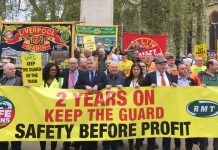 RMT marked two years of strikes by the union to ‘Keep the Guard on the Train’ with a demonstration opposite parliament yesterday