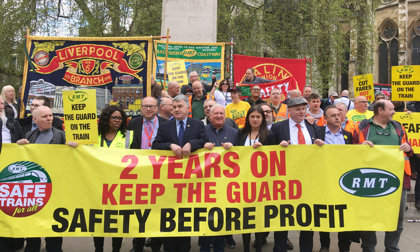 RMT marked two years of strikes by the union to ‘Keep the Guard on the Train’ with a demonstration opposite parliament yesterday