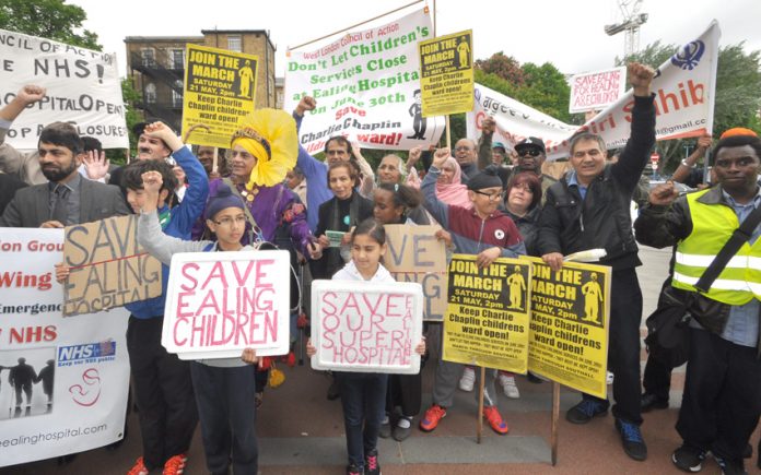 Ealing residents pictured here with Charlie Chaplin (back, left) fought really hard to stop the closure of Ealing Hospital’s Charlie Chaplin Children’s ward in May 2016 – children’s departments are threatened across the country while doctors face ‘burnout
