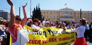 Greek hospital workers demonstrating against health cuts and mass sackings of short-contract workers outside the Vouli (Greek parliament) last Wednesday