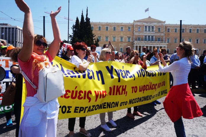 Greek hospital workers demonstrating against health cuts and mass sackings of short-contract workers outside the Vouli (Greek parliament) last Wednesday