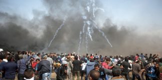 Palestinians on the Great March of Return on the Gaza border on Friday defy Israeli army snipers and hails of teargas