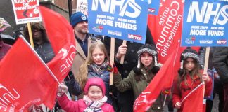 Children join the NHS march through London earlier this year – West Midlands Ambulance Service is pulling out of its contract