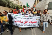 Palestinians march defiantly as part of the Great March of Return