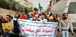 Palestinians march defiantly as part of the Great March of Return