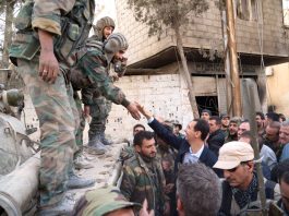 Syrian troops greet President Assad in Ghouta after successfully liberating the district from terrorist occupation