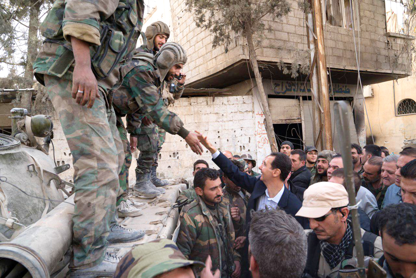 Syrian troops greet President Assad in Ghouta after successfully liberating the district from terrorist occupation