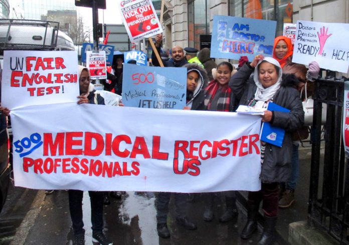 Health professionals on the march in February demand the government grant overseas doctors visas to come and work in the NHS where they are desperately needed