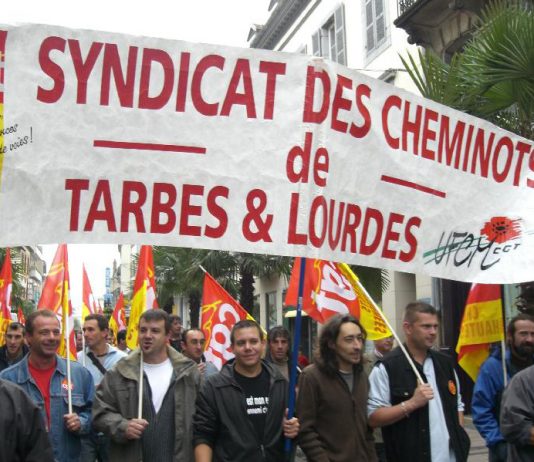 Striking French railworkers on the march – they are on striking for two days in every five until the end of next month