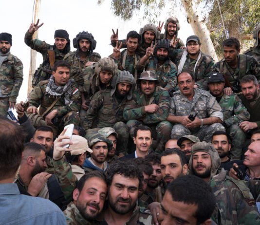 Syrian President ASSAD (centre) with Syrian troops after they liberated the region from Islamist terrorists