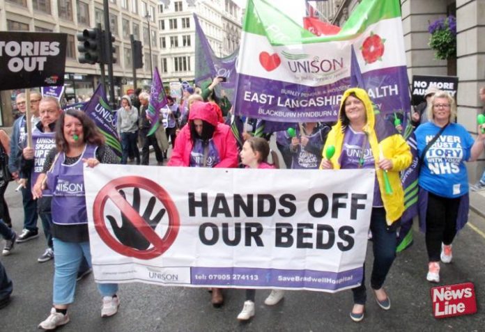 Health workers on the TUC march on May 12th – thousands of patients have been discharged too soon because of a lack of beds