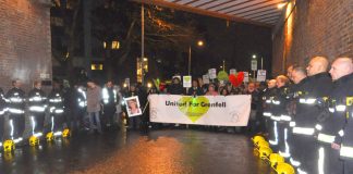 Grenfell firefighters form a Guard of Honour for the silent march – the community supports them 100 per cent