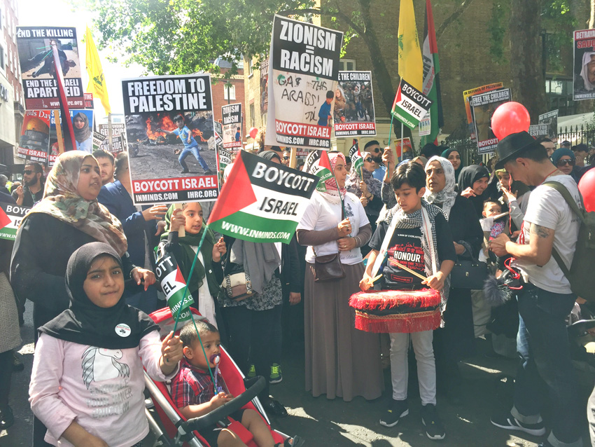 An enthusiastic crowd gathers at the start of yesterday’s Al Quds march outside the Saudi Embassy in central London
