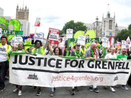 The front of Saturday’s march passes Parliament