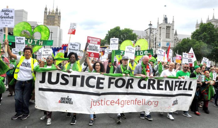 The front of Saturday’s march passes Parliament