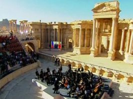 Drive To Recover Stolen Syrian Antiquities! The Marinsky Orchestra performs in the ancient amphitheatre in Palmyra after it was liberated from ISIS by Syrian and Russian forces in 2016