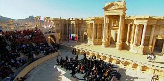 The Marinsky Orchestra performs in the ancient amphitheatre in Palmyra after it was liberated from ISIS by Syrian and Russian forces in 2016
