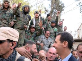 Syrian troops greet President Assad after the victory over the terrorists in Eastern Ghouta