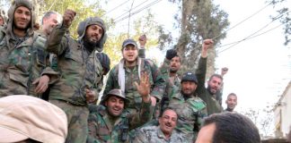 Syrian troops greet President Assad after the victory over the terrorists in Eastern Ghouta