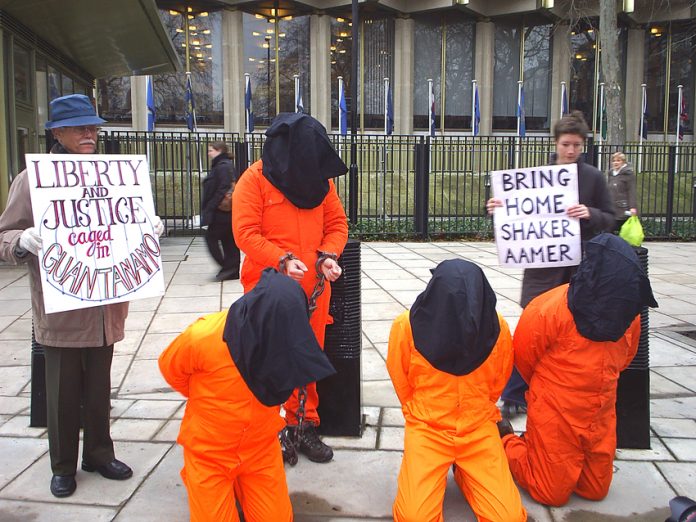 Demonstration outside the US Embassy in London demanding that Guantanamo Bay is shut down