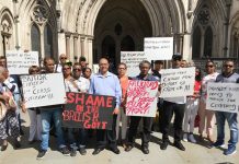 Chagos Islanders supporting DOMINIQUE ELYSSE (centre, wearing a light shirt) outside the High Court in London yesterday morning