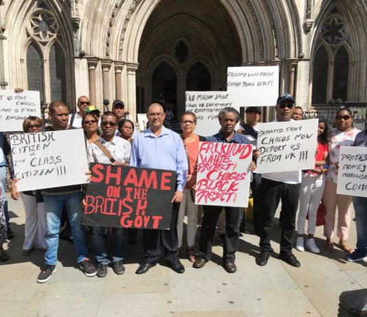 Chagos Islanders supporting DOMINIQUE ELYSSE (centre, wearing a light shirt) outside the High Court in London yesterday morning