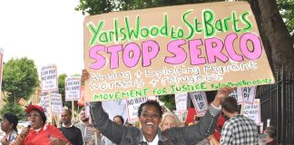 Protester demands the Seco-run Yarl’s Wood detention centre is shut down – Serco are now evicting hundreds of asylum seekers