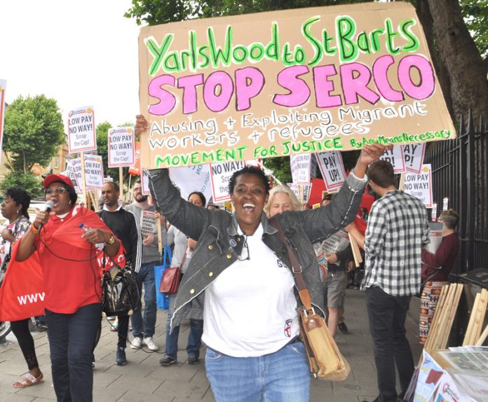 Protester demands the Seco-run Yarl’s Wood detention centre is shut down – Serco are now evicting hundreds of asylum seekers